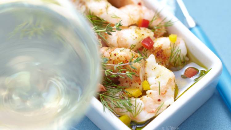 Marinated plancha-cooked king prawns